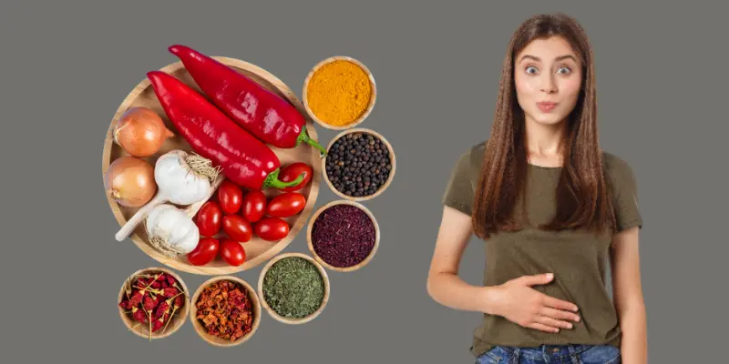 A Young White Girl Is Holding Her Belly Depicting The Stomach Problem With Defferernt Types Of Chillies Are Placed Nearby A young white girl is holding her belly depicting the stomach problem with defferernt types of chillies are placed nearby